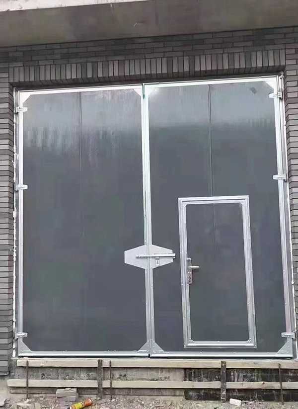 康乐工业平开门在大型设备制造车间的应用实例